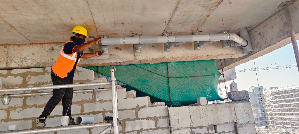 Suspended Under-Slab Soil and Drainage Pipe Installation